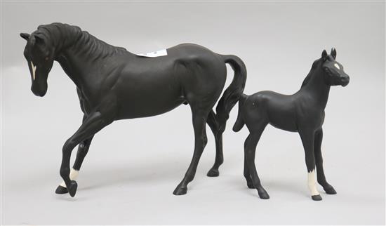 A Royal Doulton mare and foal largest 18cm.